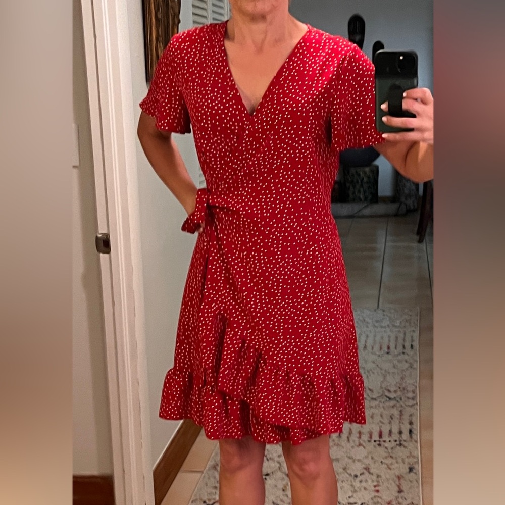 Perfect summer red salsa-style ruffled edge wrap dress. Very flattering.